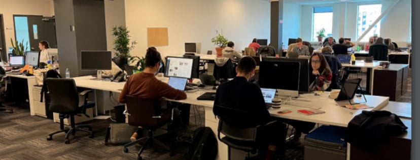 Journalists working at their desks at Métro Média's offices